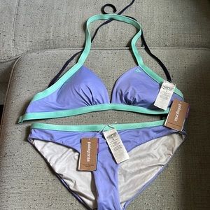 Never worn bikini small top, medium bottoms